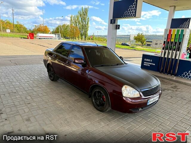 Червоний ВАЗ Priora, об'ємом двигуна 1.6 л та пробігом 189 тис. км за 2200 $, фото 1 на Automoto.ua