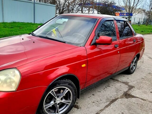 Красный ВАЗ Priora, объемом двигателя 1.6 л и пробегом 148 тыс. км за 2900 $, фото 1 на Automoto.ua