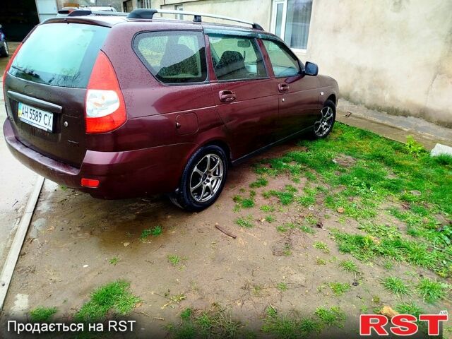 Красный ВАЗ Priora, объемом двигателя 1.6 л и пробегом 270 тыс. км за 1900 $, фото 1 на Automoto.ua