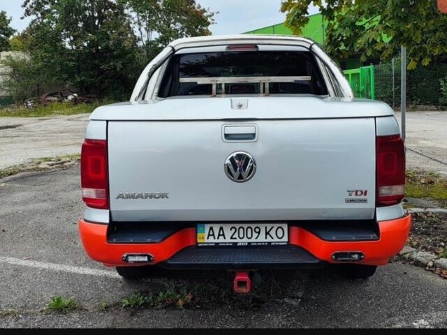 Сірий Фольксваген Амарок, об'ємом двигуна 2 л та пробігом 335 тис. км за 13000 $, фото 1 на Automoto.ua