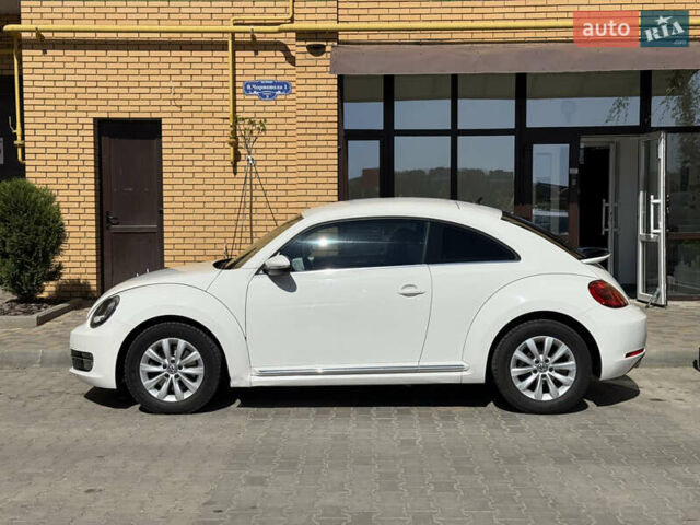 Белый Фольксваген Битл, объемом двигателя 1.4 л и пробегом 145 тыс. км за 9800 $, фото 1 на Automoto.ua