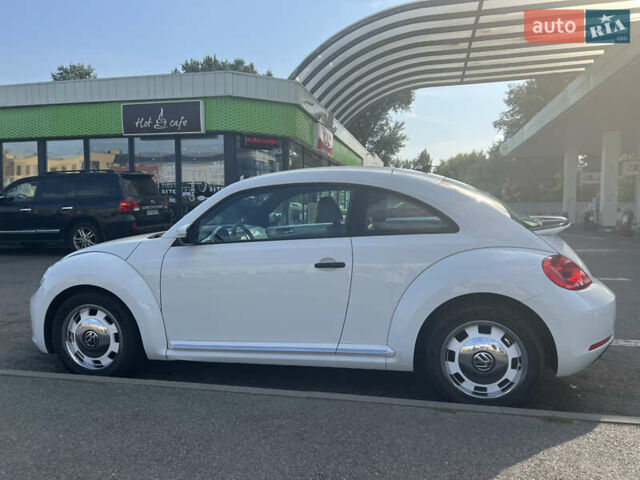 Белый Фольксваген Битл, объемом двигателя 1.8 л и пробегом 65 тыс. км за 15000 $, фото 1 на Automoto.ua