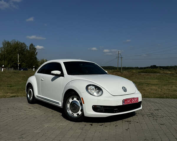 Фольксваген Битл 2015 в Костополе на Automoto.ua Белый Фольксваген Битл, объемом двигателя 1.8 л и пробегом 132 тыс. км за 10900 $, фото 1 на Automoto.ua
