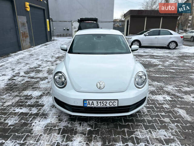Белый Фольксваген Битл, объемом двигателя 1.8 л и пробегом 65 тыс. км за 11000 $, фото 1 на Automoto.ua