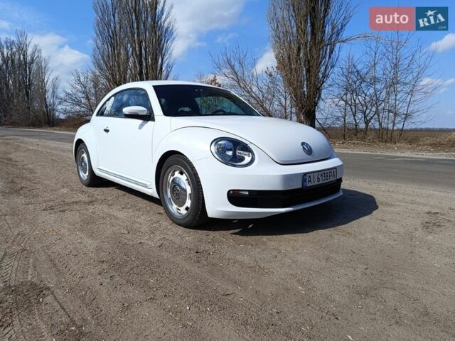 Белый Фольксваген Битл, объемом двигателя 1.8 л и пробегом 141 тыс. км за 14000 $, фото 1 на Automoto.ua
