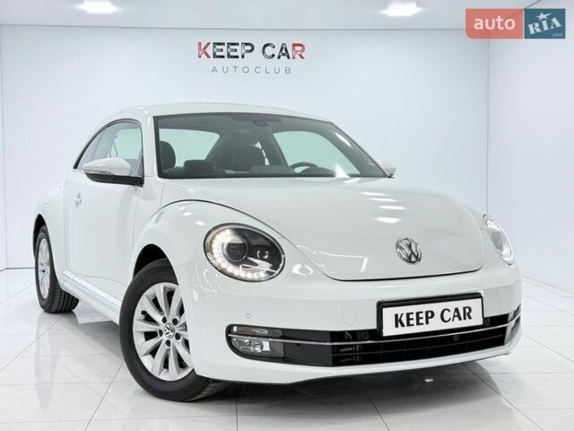 Белый Фольксваген Битл, объемом двигателя 1.4 л и пробегом 63 тыс. км за 11900 $, фото 1 на Automoto.ua