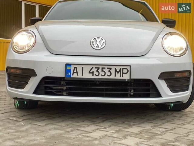 Белый Фольксваген Битл, объемом двигателя 1.8 л и пробегом 111 тыс. км за 13700 $, фото 1 на Automoto.ua