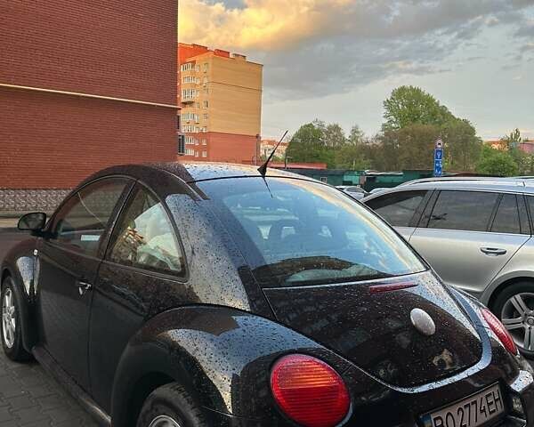 Черный Фольксваген Битл, объемом двигателя 2 л и пробегом 180 тыс. км за 4000 $, фото 1 на Automoto.ua