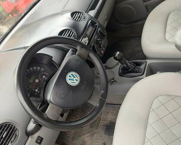 Черный Фольксваген Битл, объемом двигателя 2 л и пробегом 230 тыс. км за 4100 $, фото 1 на Automoto.ua