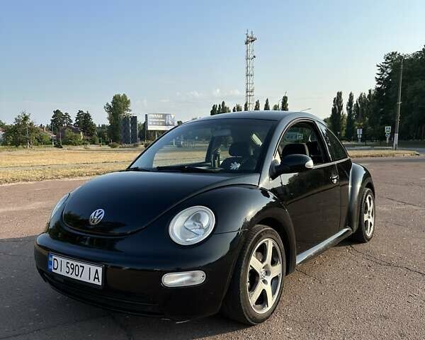 Черный Фольксваген Битл, объемом двигателя 1.6 л и пробегом 210 тыс. км за 5900 $, фото 1 на Automoto.ua