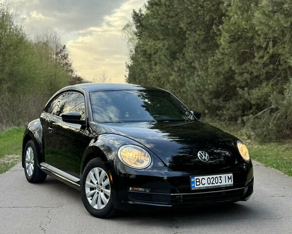 Черный Фольксваген Битл, объемом двигателя 1.8 л и пробегом 180 тыс. км за 8750 $, фото 1 на Automoto.ua