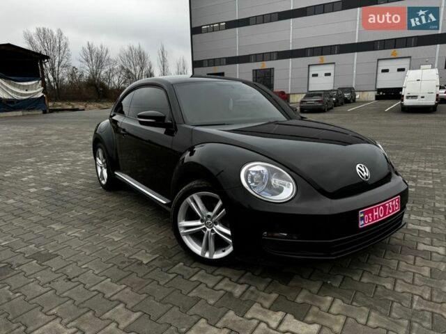 Черный Фольксваген Битл, объемом двигателя 1.8 л и пробегом 194 тыс. км за 10999 $, фото 1 на Automoto.ua