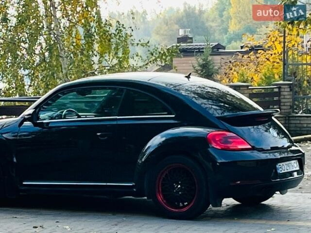 Черный Фольксваген Битл, объемом двигателя 1.39 л и пробегом 143 тыс. км за 14200 $, фото 1 на Automoto.ua