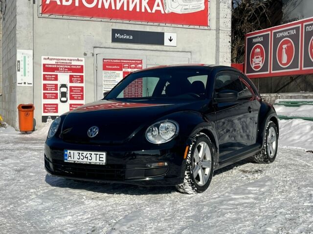 Черный Фольксваген Битл, объемом двигателя 1.8 л и пробегом 77 тыс. км за 10350 $, фото 1 на Automoto.ua