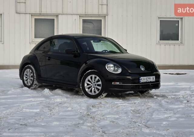 Черный Фольксваген Битл, объемом двигателя 1.8 л и пробегом 123 тыс. км за 10999 $, фото 1 на Automoto.ua