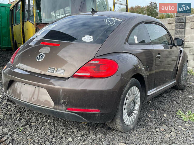 Коричневый Фольксваген Битл, объемом двигателя 1.8 л и пробегом 170 тыс. км за 4400 $, фото 1 на Automoto.ua