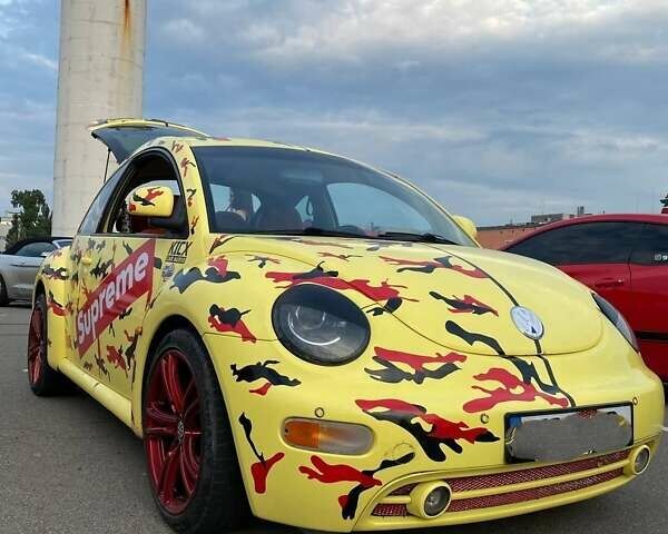 Желтый Фольксваген Битл, объемом двигателя 2 л и пробегом 307 тыс. км за 5450 $, фото 1 на Automoto.ua