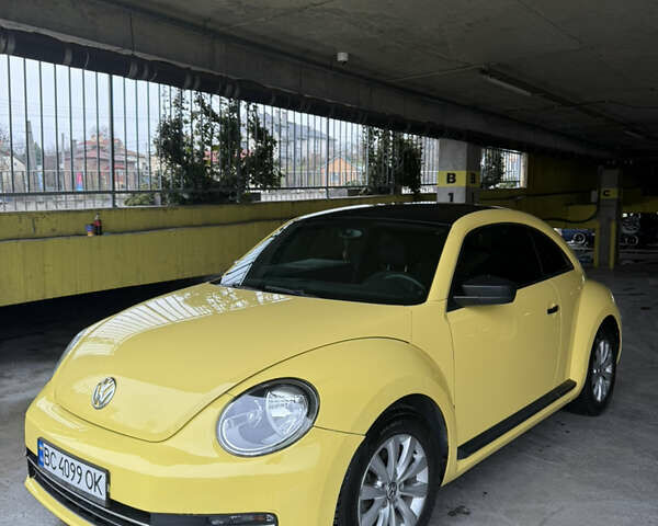 Желтый Фольксваген Битл, объемом двигателя 1.8 л и пробегом 157 тыс. км за 9900 $, фото 1 на Automoto.ua