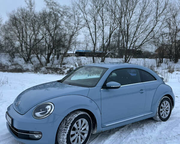 Синий Фольксваген Битл, объемом двигателя 1.4 л и пробегом 82 тыс. км за 14700 $, фото 1 на Automoto.ua