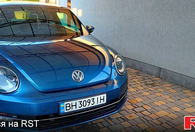 Синий Фольксваген Битл, объемом двигателя 1.4 л и пробегом 71 тыс. км за 12800 $, фото 1 на Automoto.ua