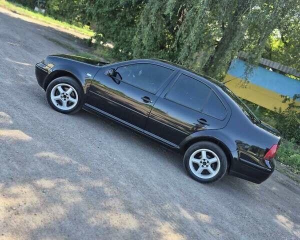 Черный Фольксваген Бора, объемом двигателя 1.6 л и пробегом 305 тыс. км за 4200 $, фото 1 на Automoto.ua