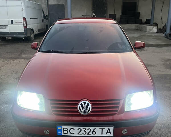 Красный Фольксваген Бора, объемом двигателя 1.4 л и пробегом 220 тыс. км за 3200 $, фото 1 на Automoto.ua