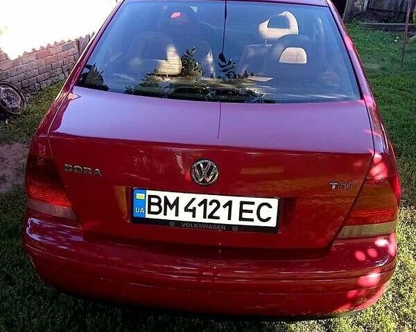 Красный Фольксваген Бора, объемом двигателя 1.9 л и пробегом 290 тыс. км за 4500 $, фото 1 на Automoto.ua