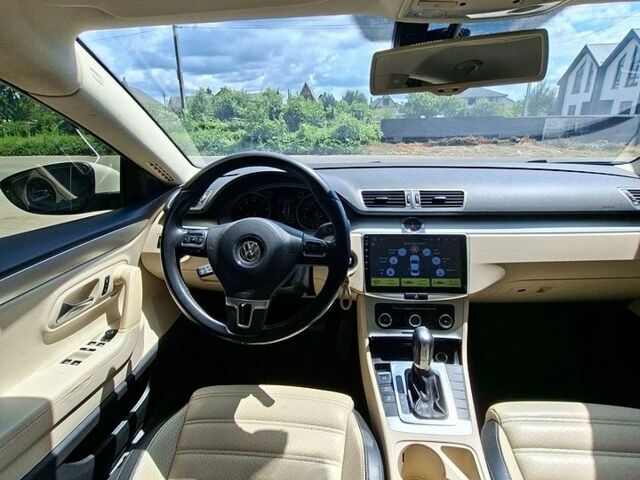 Білий Фольксваген CC / Passat CC, об'ємом двигуна 1.98 л та пробігом 207 тис. км за 9000 $, фото 1 на Automoto.ua