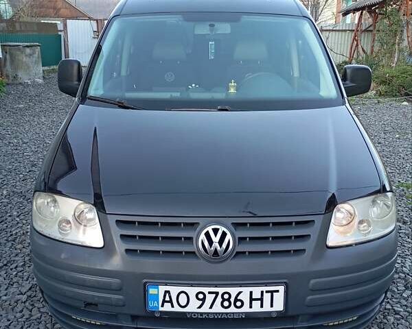 Черный Фольксваген Кадди, объемом двигателя 2 л и пробегом 438 тыс. км за 5500 $, фото 1 на Automoto.ua