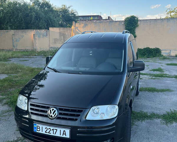 Черный Фольксваген Кадди, объемом двигателя 1.6 л и пробегом 213 тыс. км за 5799 $, фото 1 на Automoto.ua