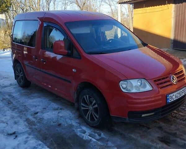 Красный Фольксваген Кадди, объемом двигателя 2 л и пробегом 290 тыс. км за 5500 $, фото 1 на Automoto.ua
