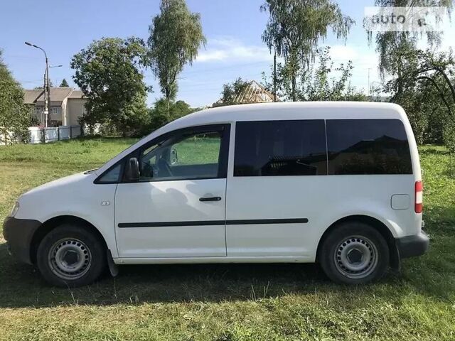 Білий Фольксваген Caddy пасс., об'ємом двигуна 2 л та пробігом 177 тис. км за 5999 $, фото 1 на Automoto.ua