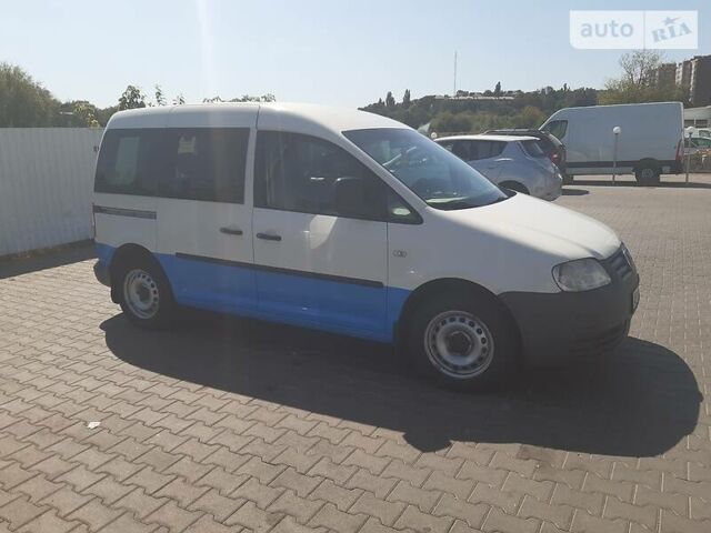 Білий Фольксваген Caddy пасс., об'ємом двигуна 2 л та пробігом 240 тис. км за 5800 $, фото 1 на Automoto.ua