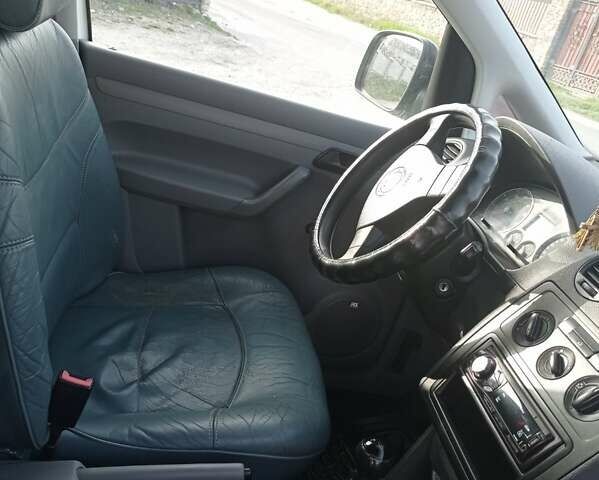 Білий Фольксваген Caddy пасс., об'ємом двигуна 2 л та пробігом 300 тис. км за 5100 $, фото 1 на Automoto.ua