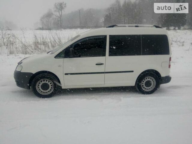 Білий Фольксваген Caddy пасс., об'ємом двигуна 2 л та пробігом 198 тис. км за 7000 $, фото 1 на Automoto.ua