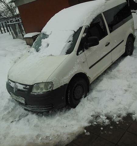 Білий Фольксваген Caddy пасс., об'ємом двигуна 2 л та пробігом 100 тис. км за 5999 $, фото 1 на Automoto.ua