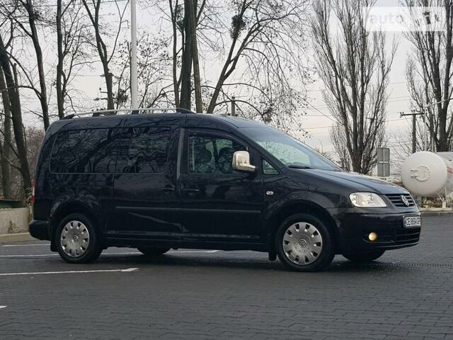 Чорний Фольксваген Caddy пасс., об'ємом двигуна 2 л та пробігом 220 тис. км за 9555 $, фото 1 на Automoto.ua