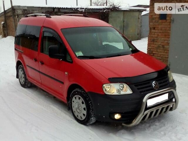 Гранатовий Фольксваген Caddy пасс., об'ємом двигуна 2 л та пробігом 135 тис. км за 8400 $, фото 1 на Automoto.ua