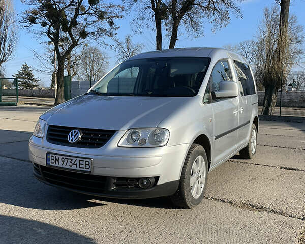 Сірий Фольксваген Caddy пасс., об'ємом двигуна 2 л та пробігом 190 тис. км за 7900 $, фото 1 на Automoto.ua