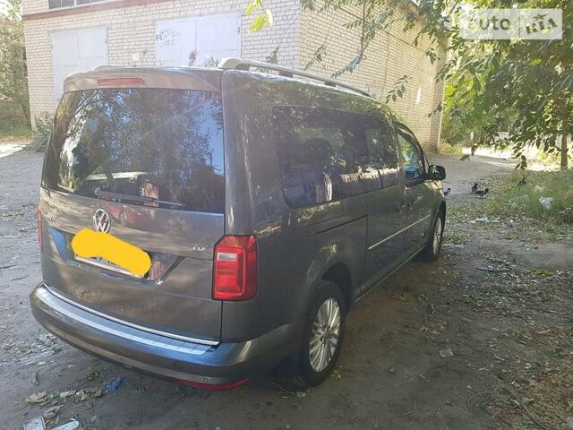 Сірий Фольксваген Caddy пасс., об'ємом двигуна 2 л та пробігом 19 тис. км за 32000 $, фото 1 на Automoto.ua