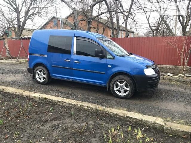 Синій Фольксваген Caddy пасс., об'ємом двигуна 2 л та пробігом 310 тис. км за 5700 $, фото 1 на Automoto.ua