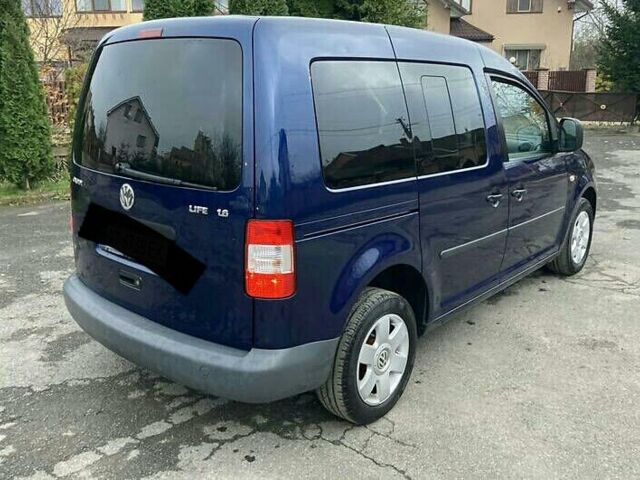 Синій Фольксваген Caddy пасс., об'ємом двигуна 1.6 л та пробігом 235 тис. км за 3800 $, фото 1 на Automoto.ua