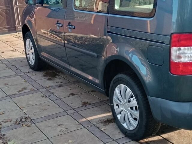 Серый Фольксваген Кадди, объемом двигателя 1 л и пробегом 228 тыс. км за 8200 $, фото 1 на Automoto.ua