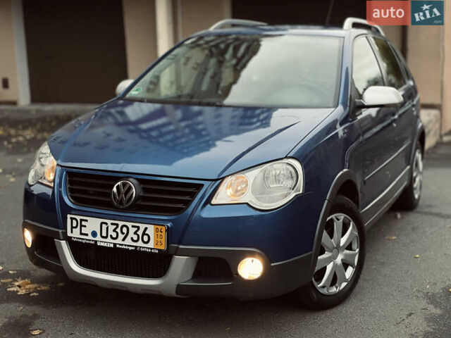 Синій Фольксваген Кросс Поло, об'ємом двигуна 1.4 л та пробігом 214 тис. км за 5799 $, фото 1 на Automoto.ua