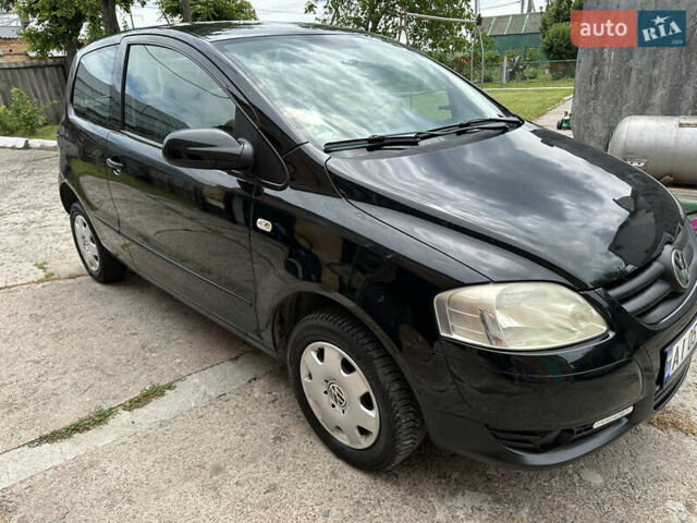 Черный Фольксваген Фокс, объемом двигателя 1.2 л и пробегом 245 тыс. км за 4000 $, фото 1 на Automoto.ua