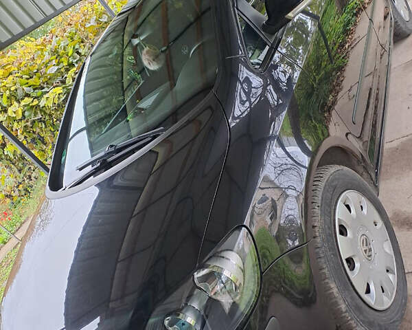 Черный Фольксваген Гольф Плюс, объемом двигателя 1.39 л и пробегом 200 тыс. км за 5900 $, фото 1 на Automoto.ua