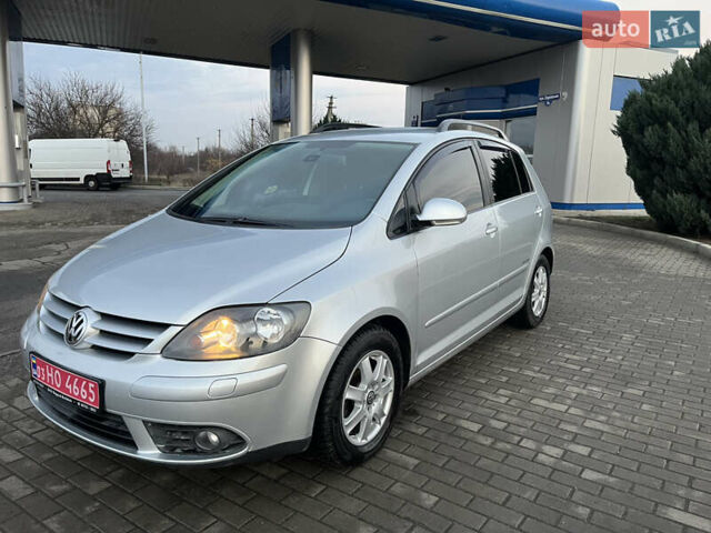Серый Фольксваген Гольф Плюс, объемом двигателя 1.4 л и пробегом 243 тыс. км за 7300 $, фото 1 на Automoto.ua