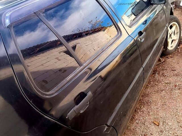 Черный Фольксваген Гольф, объемом двигателя 1.4 л и пробегом 0 тыс. км за 1300 $, фото 1 на Automoto.ua