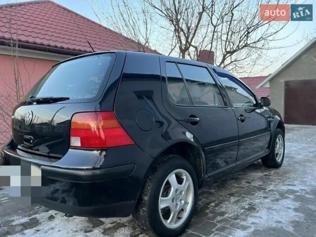 Черный Фольксваген Гольф, объемом двигателя 1.4 л и пробегом 250 тыс. км за 2900 $, фото 1 на Automoto.ua