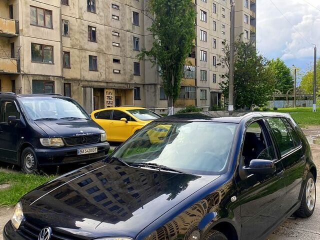 Черный Фольксваген Гольф, объемом двигателя 1.4 л и пробегом 230 тыс. км за 3950 $, фото 1 на Automoto.ua